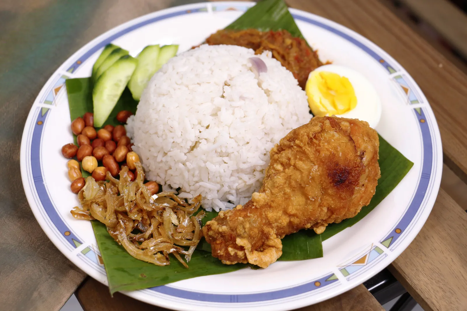 A mixed-rice style selection of prepared dishes