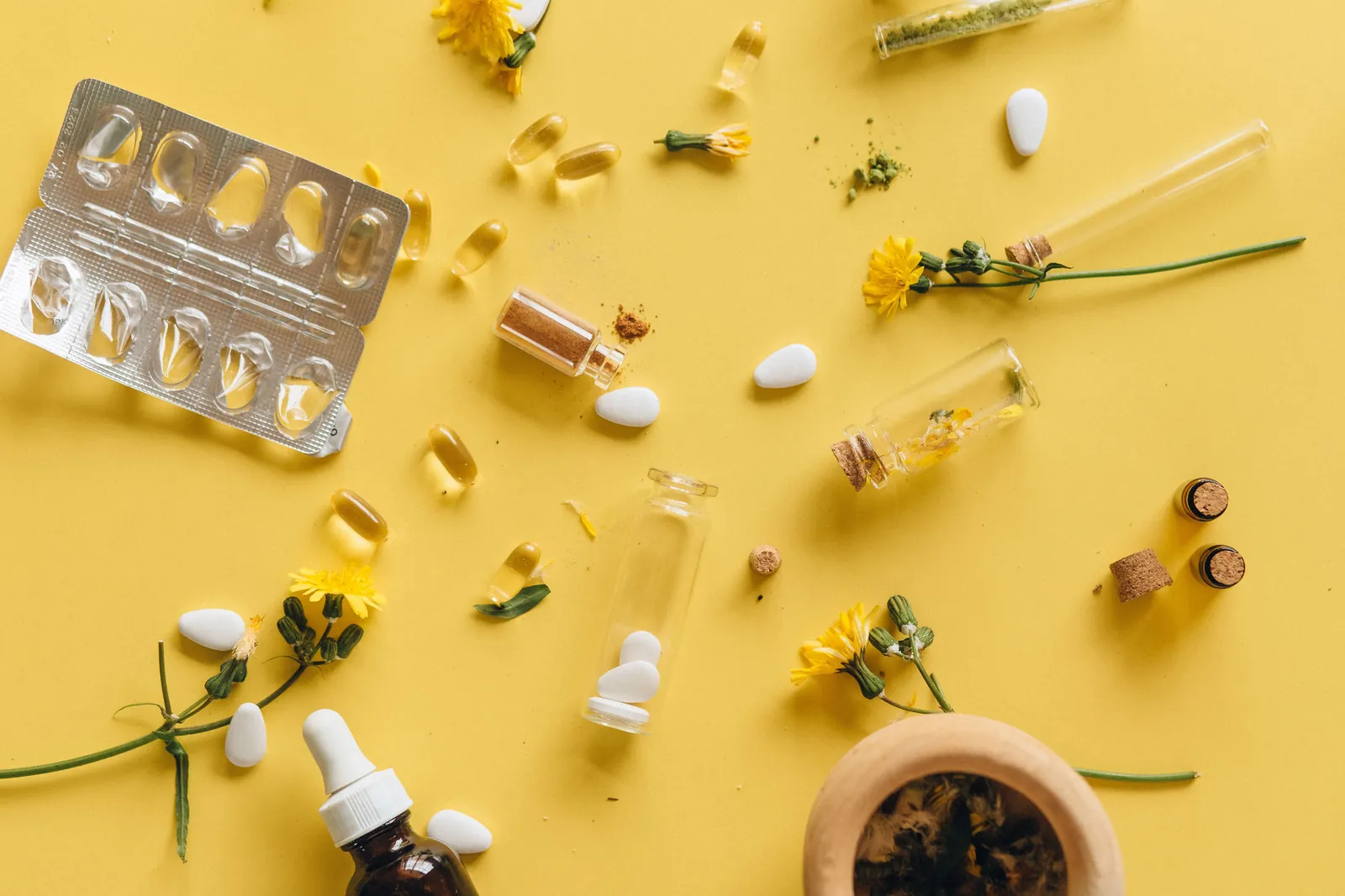 Capsules and skincare products laid out together